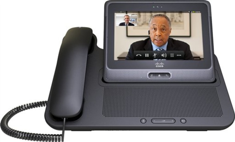 This undated product image provided Tuesday, June 29, 2010, by Cisco shows Cius, a tablet computer the company plans to release in 2011 with the ability to do video calls. The Cius stands in its docking station with handset. (AP Photo/Cisco) ** NO SALES **